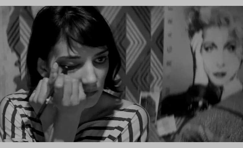 A Girl Walks Home Alone at Night