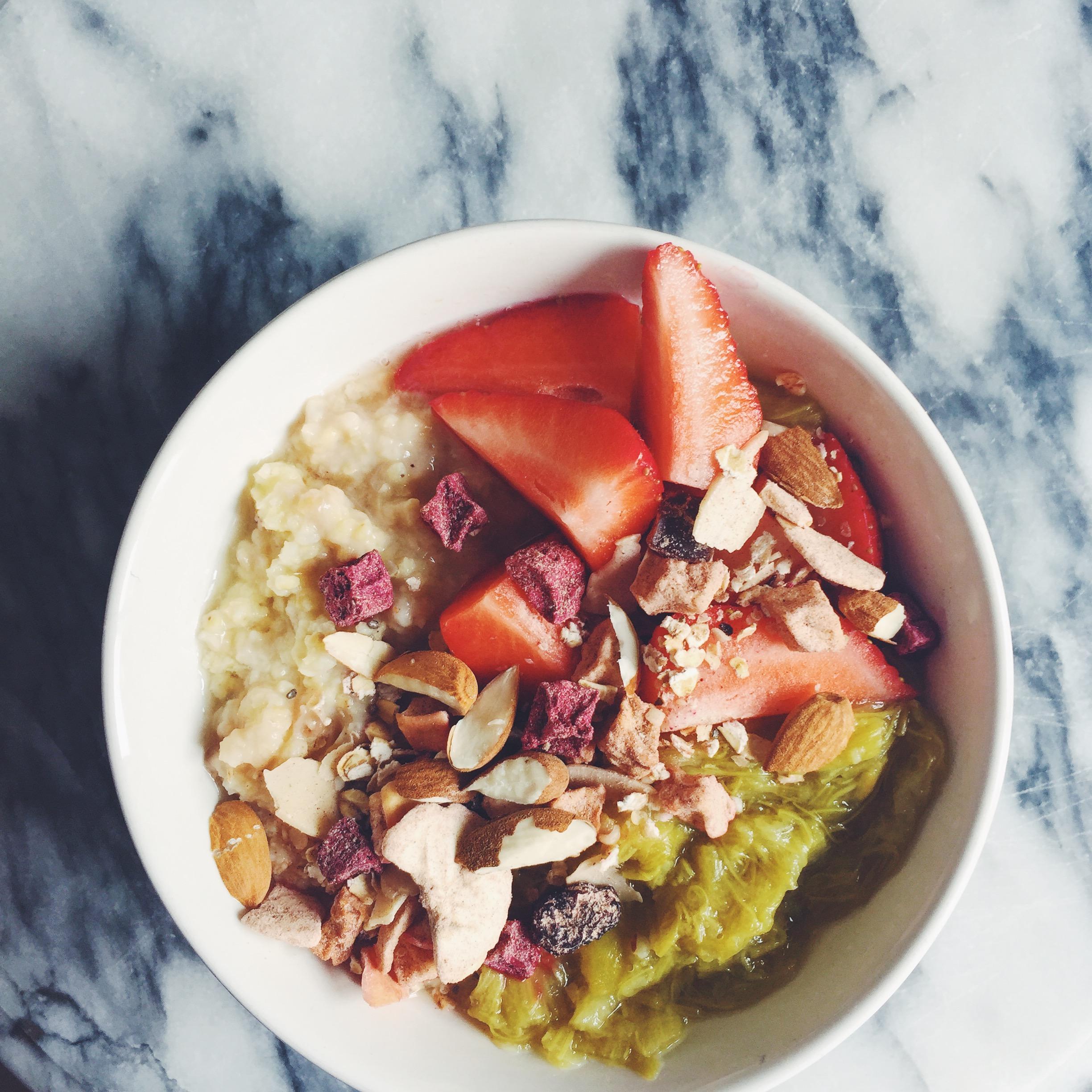 Creamy banana millet porridge with poached rhubarb